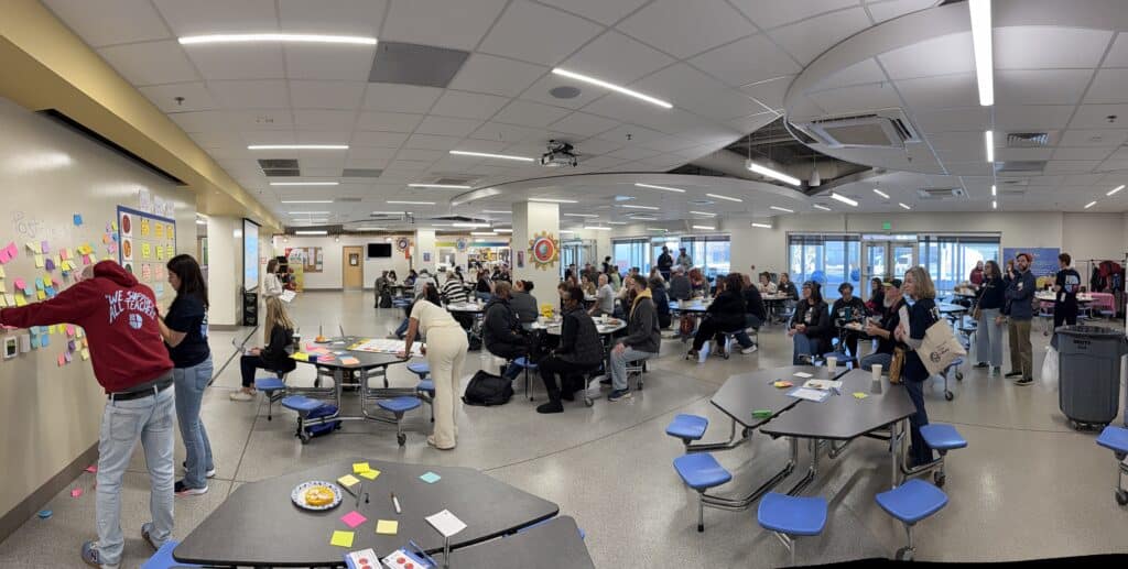 Educators convene in Explore! Community School's open cafeteria on a Saturday to discuss relevant topics and issues to them at last year's EdCampNash.